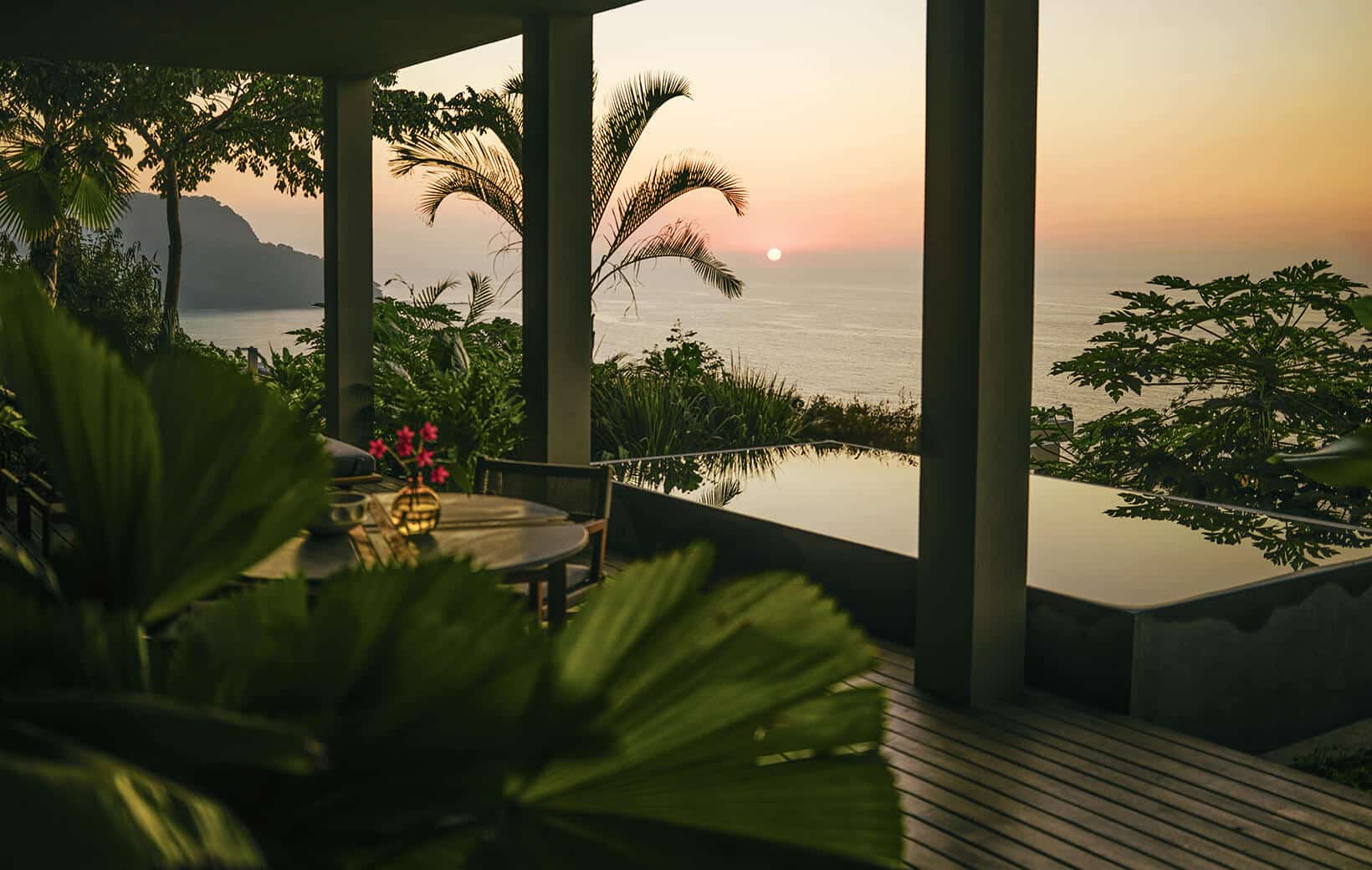 sunset with ocean view reflects off private plunge pool at rosewood mandarina