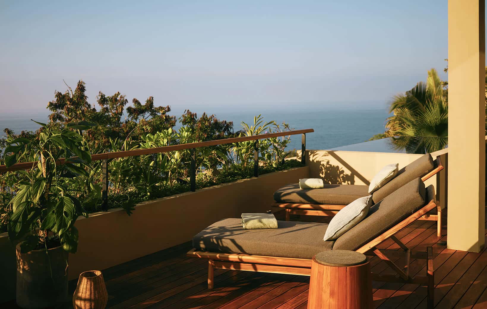 private loungers on hotel room terrace